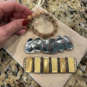 Holiday outfit stretch, Silver, Gold and coral bracelets.